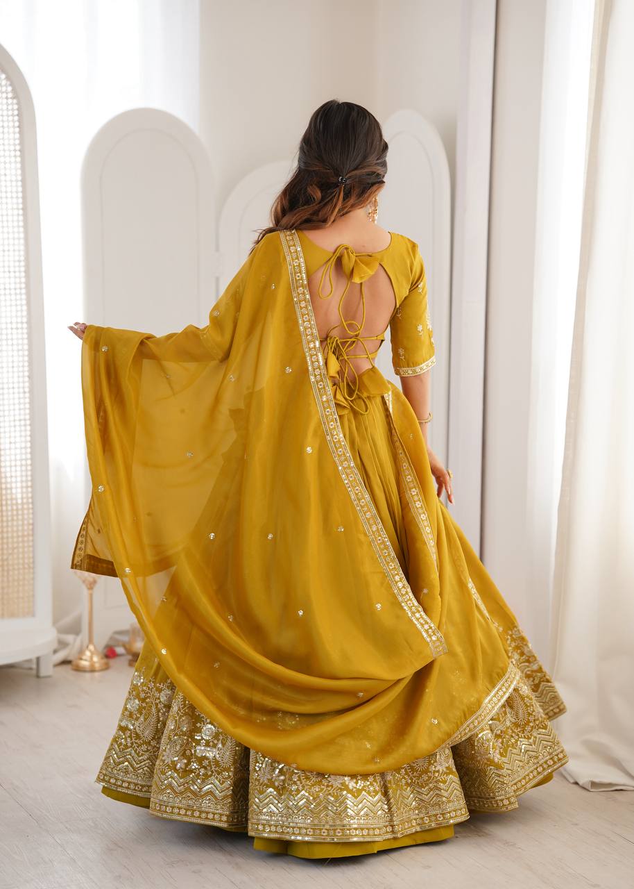 Grand Celebration Simmer Silk Lehenga With Rich Embroidery & CanCan Flair