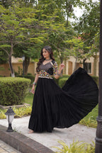 Ruhani Rust & Black Kutchi Gamthi Mirror Work 12-Metre Flair Navratri Gown