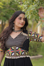 Ruhani Rust & Black Kutchi Gamthi Mirror Work 12-Metre Flair Navratri Gown