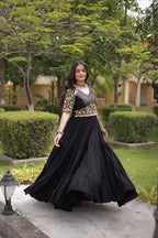 Ruhani Rust & Black Kutchi Gamthi Mirror Work 12-Metre Flair Navratri Gown