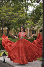 Ruhani Rust & Black Kutchi Gamthi Mirror Work 12-Metre Flair Navratri Gown