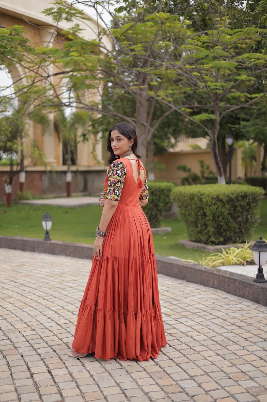 Ruhani Rust & Black Kutchi Gamthi Mirror Work 12-Metre Flair Navratri Gown