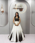 Elara Navratri Pure Cotton Ajrak Print Lehenga Choli with Heavy Hand Latkan, Ribbon Work & 6 Meter Flair