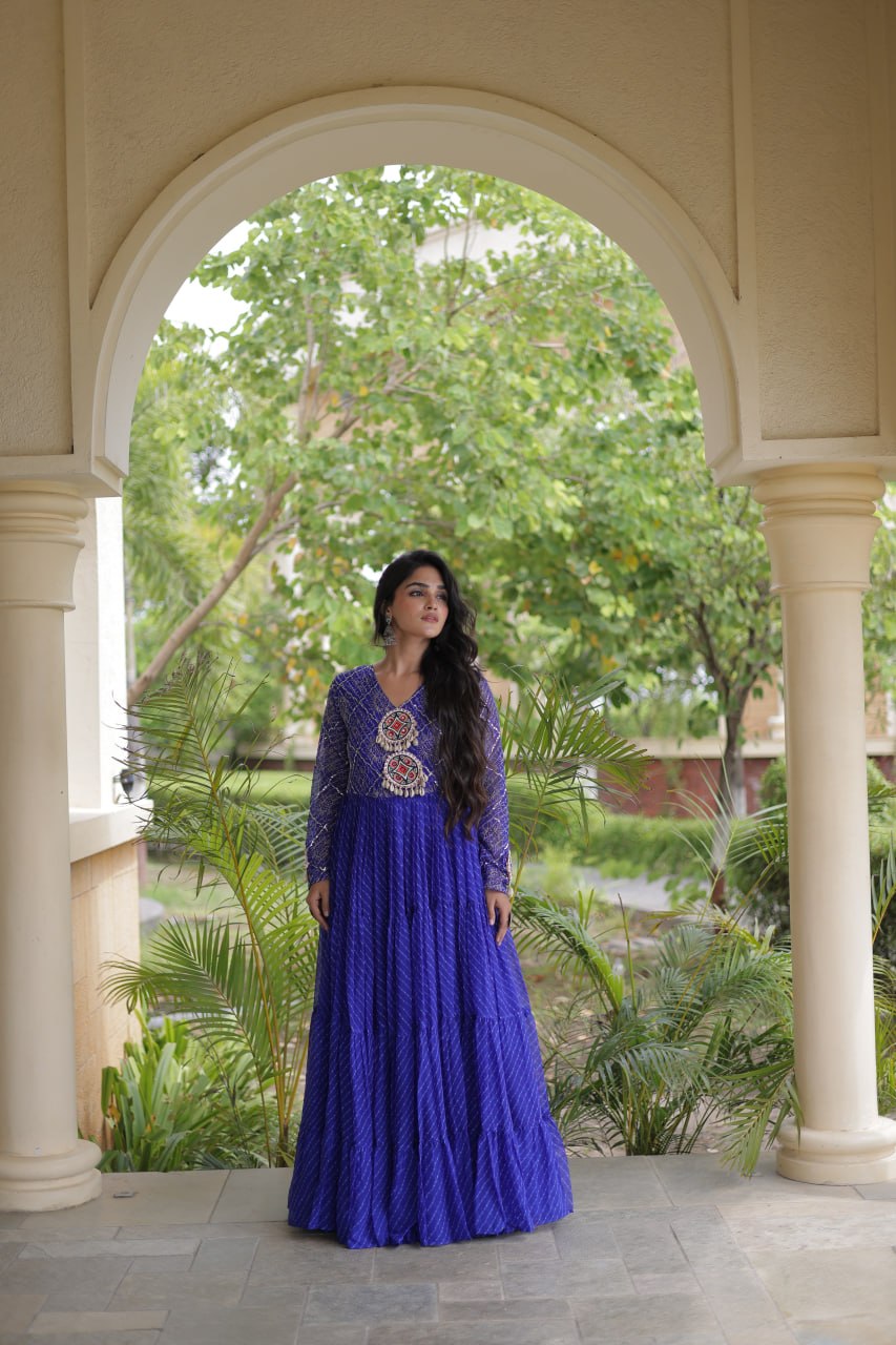 Nivara Navratri 2026 Faux Georgette Laheriya Gown with Kutchi Patchwork & 12 Meter Flair