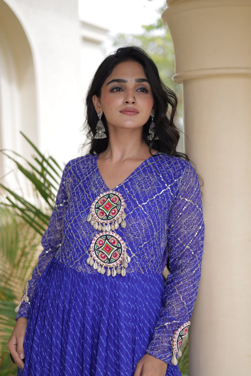 Nivara Navratri 2026 Faux Georgette Laheriya Gown with Kutchi Patchwork & 12 Meter Flair