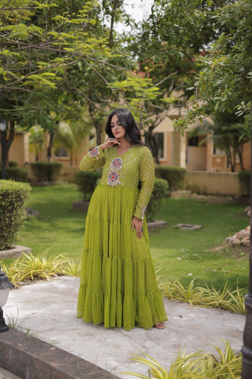 Nivara Navratri 2026 Faux Georgette Laheriya Gown with Kutchi Patchwork & 12 Meter Flair