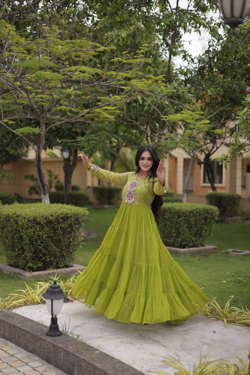 Nivara Navratri 2026 Faux Georgette Laheriya Gown with Kutchi Patchwork & 12 Meter Flair