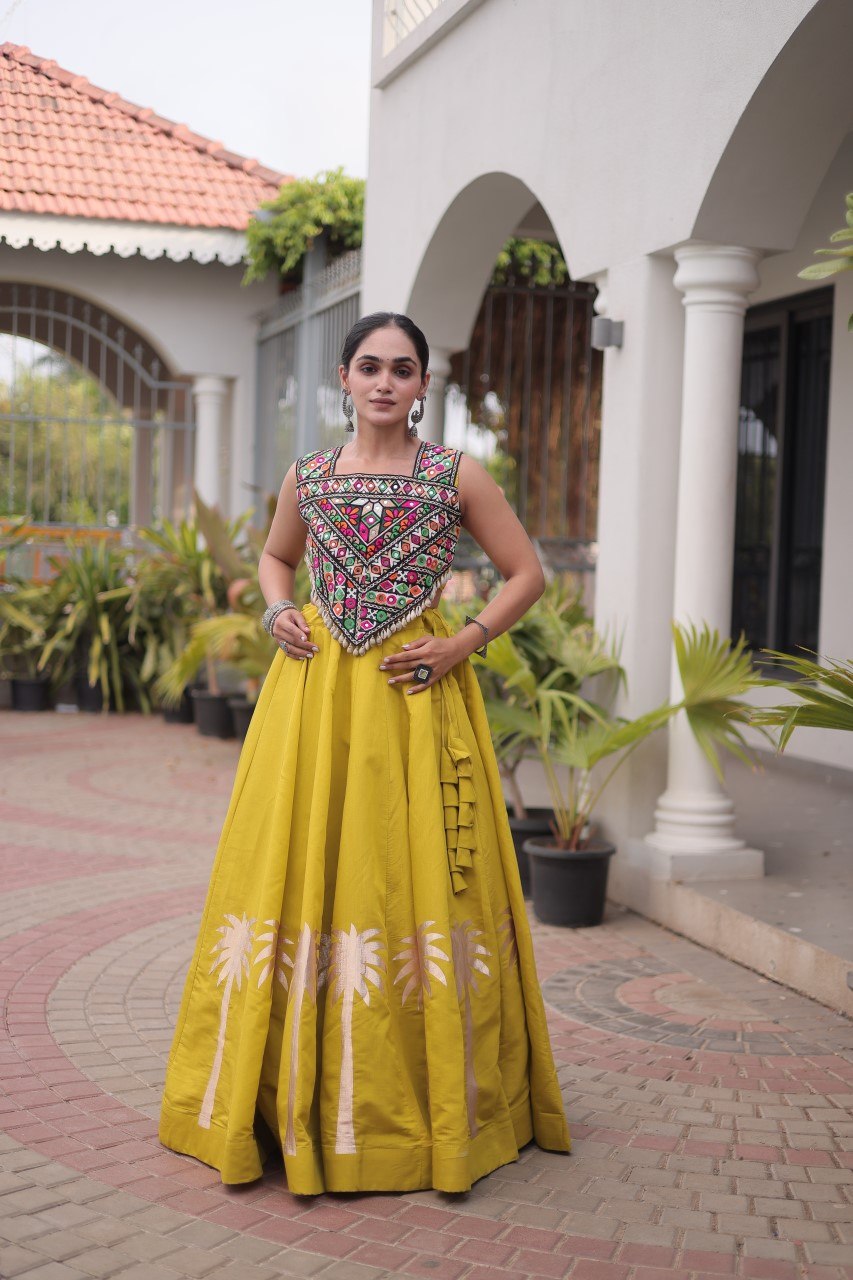 Vaidehi Roman Coconut Gota Lehenga with Kutchi Gamthi Embroidered Blouse