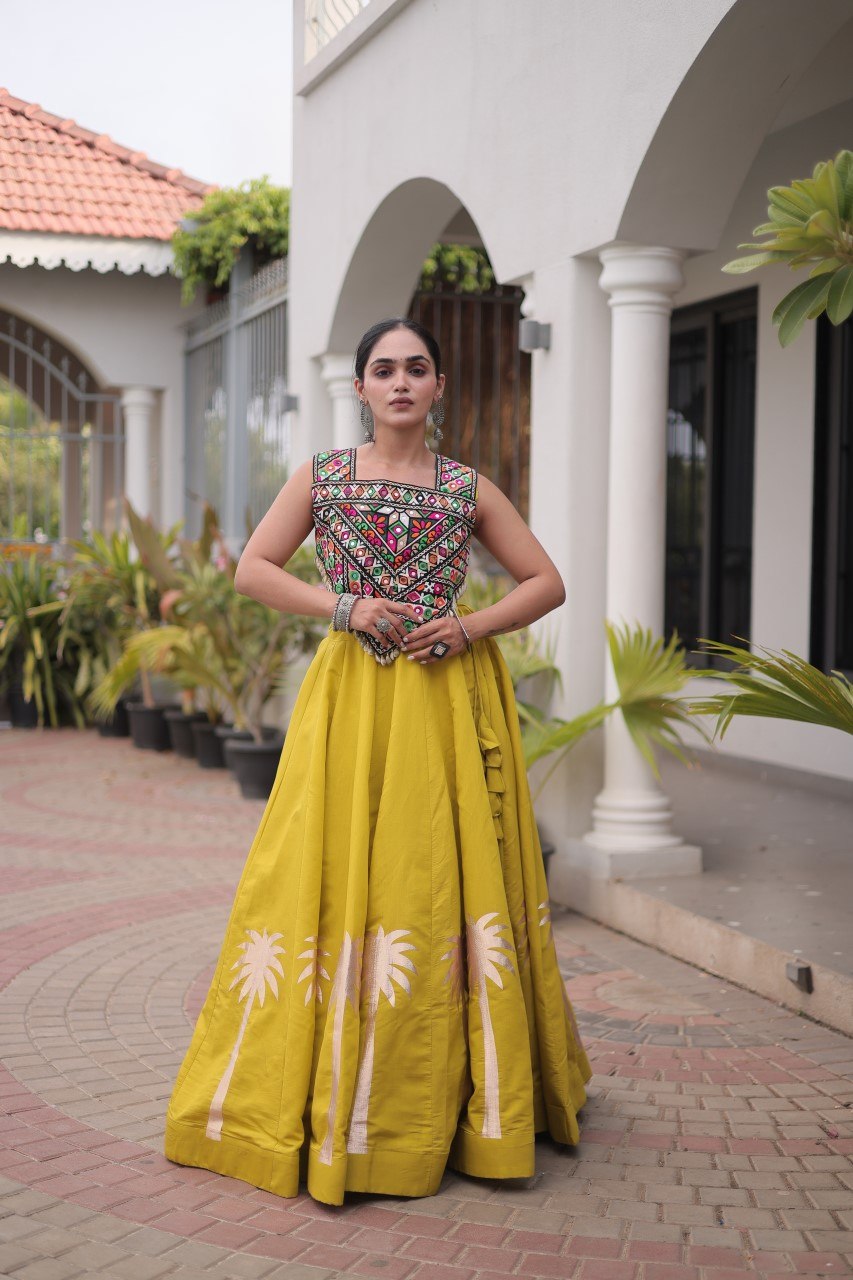 Vaidehi Roman Coconut Gota Lehenga with Kutchi Gamthi Embroidered Blouse