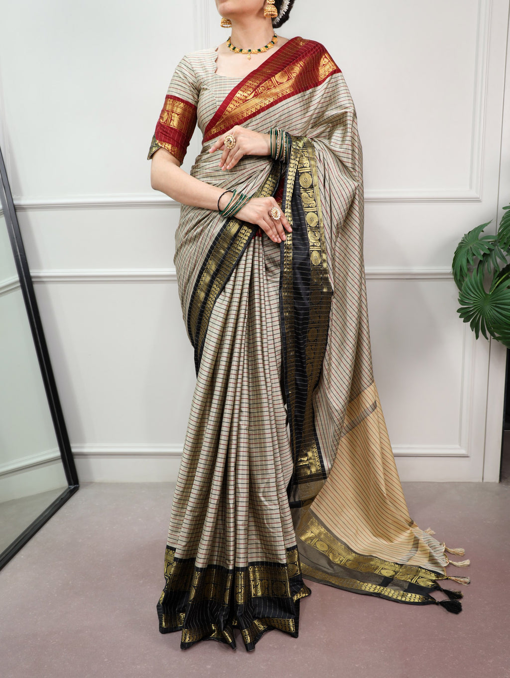 Sharvika Silk Checks Pattern Saree with Ornate Zari Border