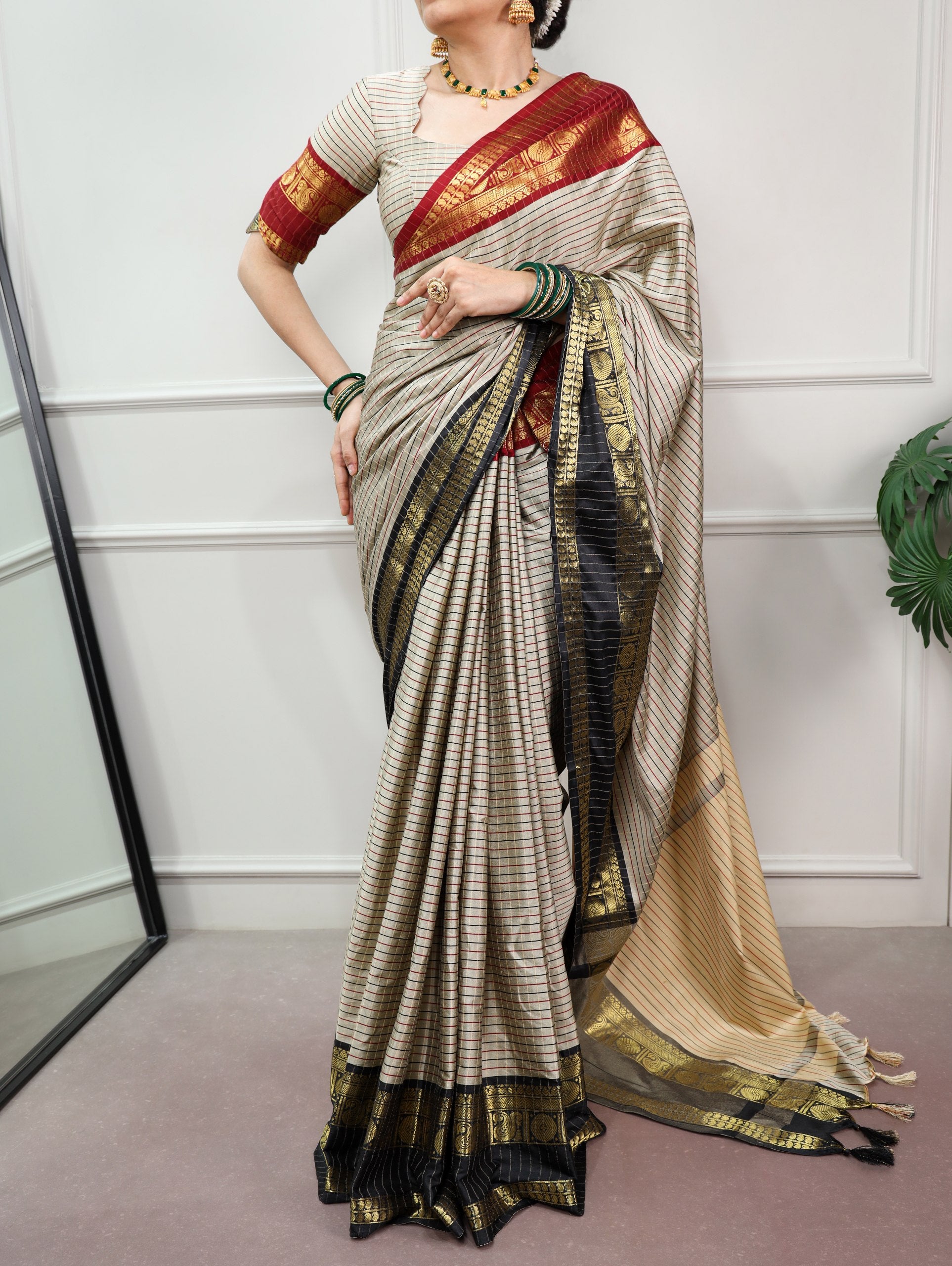 Sharvika Silk Checks Pattern Saree with Ornate Zari Border