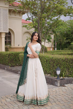 Tanirika Viscose Jacquard Zari Temple Weaving Lehenga with Blouse & Georgette Dupatta