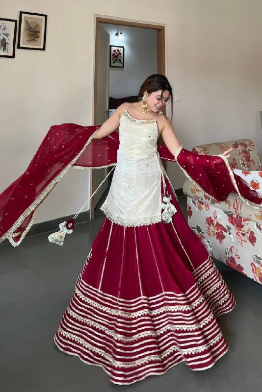 Designer Sleeveless Lehenga with Mirror Work & Embroidered Georgette Flair