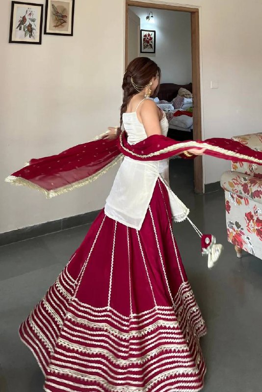 Designer Sleeveless Lehenga with Mirror Work & Embroidered Georgette Flair