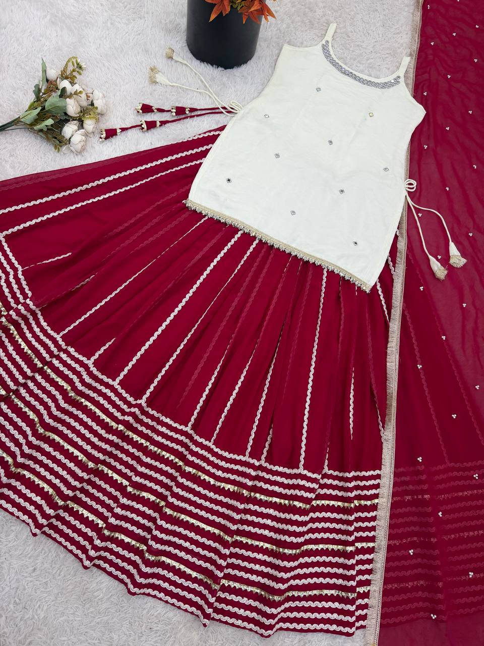 Designer Sleeveless Lehenga with Mirror Work & Embroidered Georgette Flair