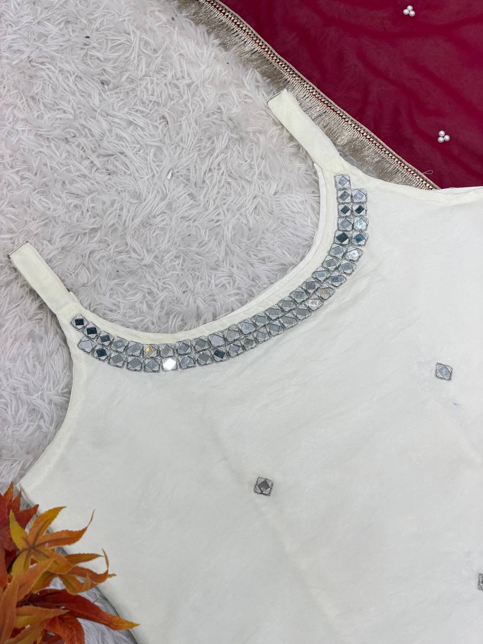 Designer Sleeveless Lehenga with Mirror Work & Embroidered Georgette Flair