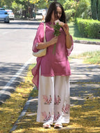 Avenza Roman Silk Kurti Palazzo Set with Embroidered Thread Work, Tassel Sleeves & Ring Dupatta