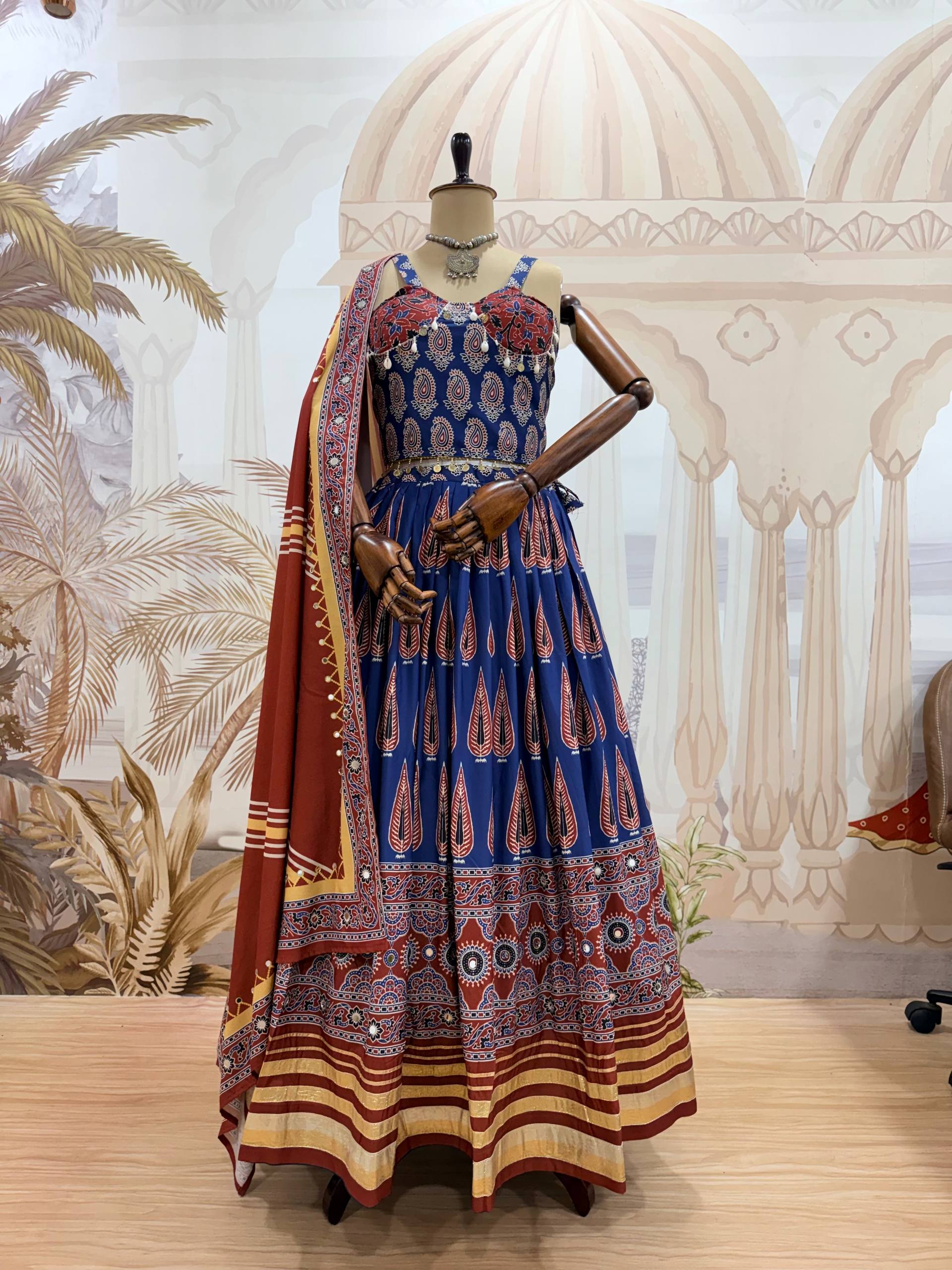 Mridulika Natural Crepe Ajrakh Print & Mirror Work Lehenga with Blouse & Dupatta
