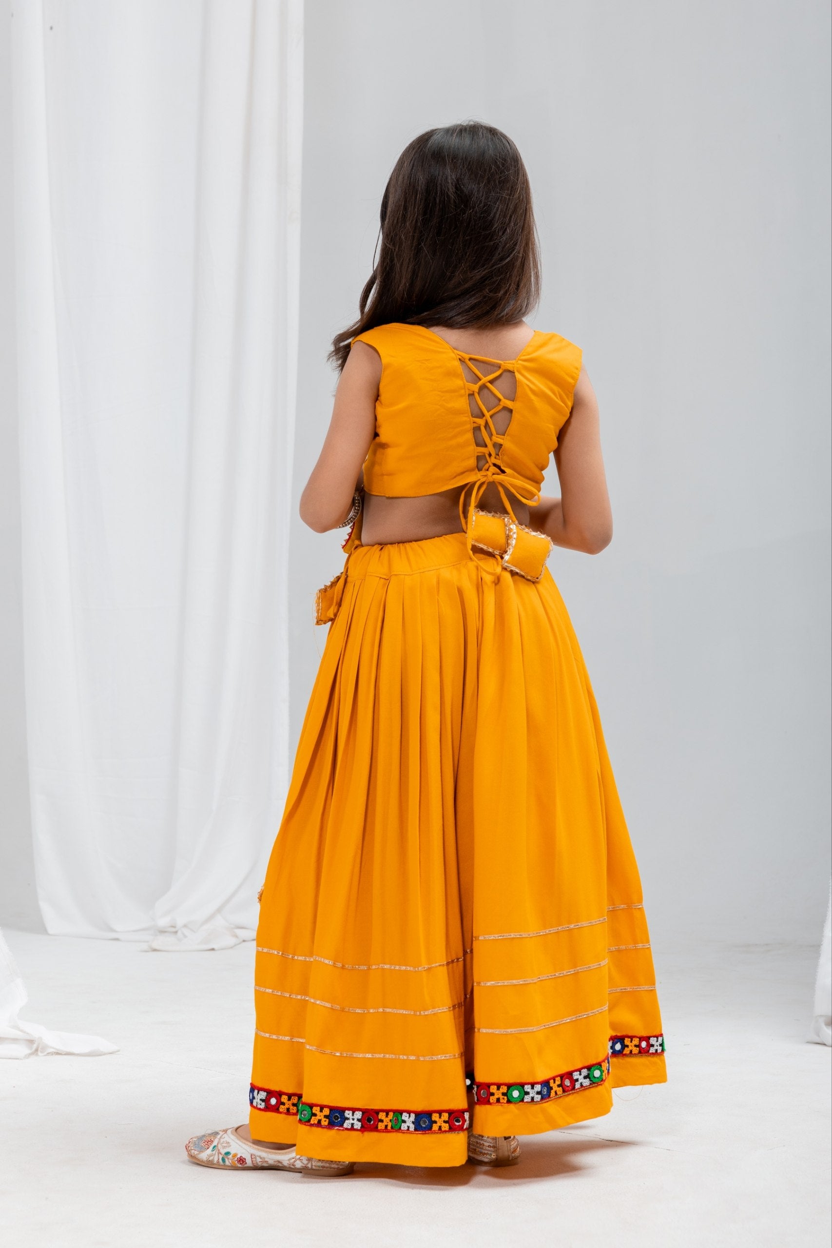 Aaradhya Mustard Rayon Cotton Mirror Work Lehenga Choli | Gamthi, Gota Patti & Samosa Lace | Kids Ethnic Wear